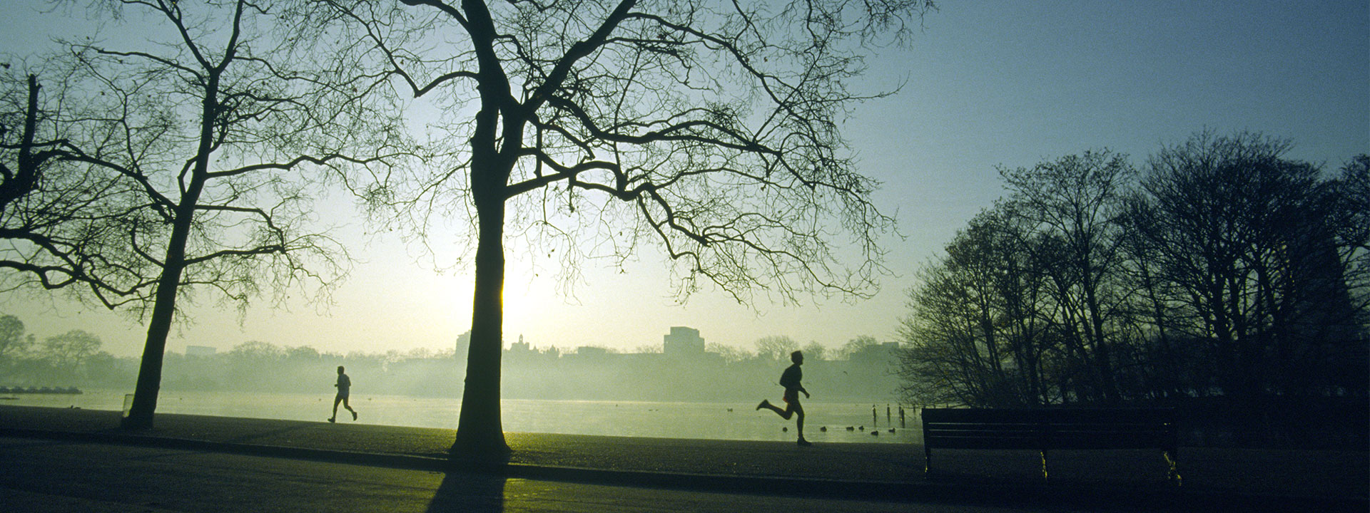 Two men running in Hyde Park 