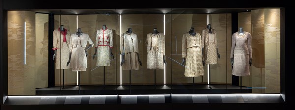 Mannequins with Chanel clothes on at exhibition